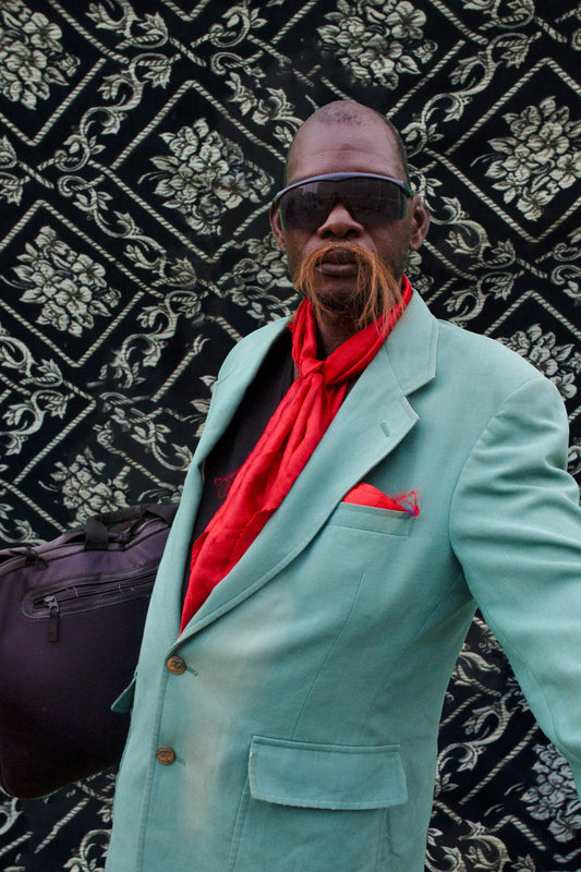 "Honourable Technology Entrepreneur" by Angolan artist Hélio Buite (2024), a conceptual photographic portrait exploring the intersection of identity, progress, and tradition in contemporary African society. Presented by Afrikanizm.